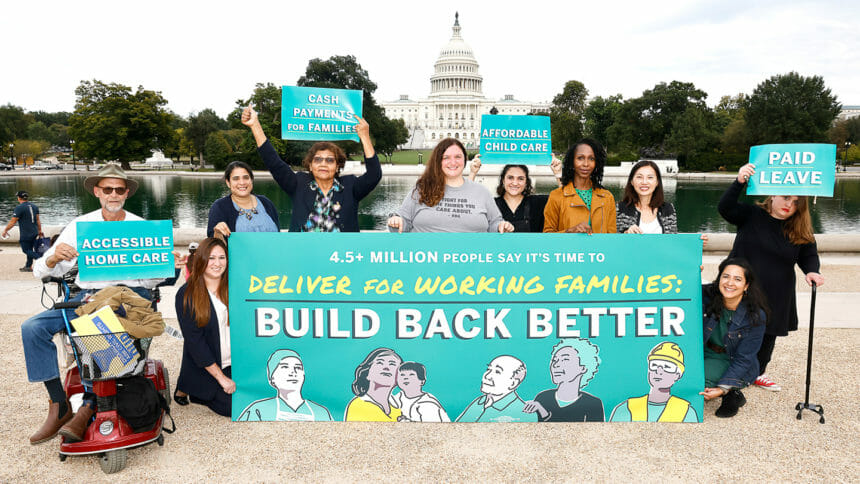 Activists demonstrate in favor of Build Back Better legislation.