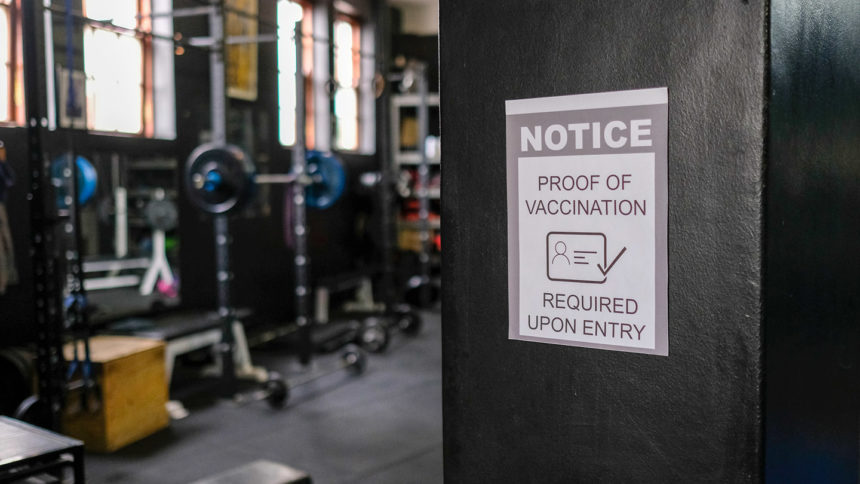 A gym requiring proof of vaccination upon entry.