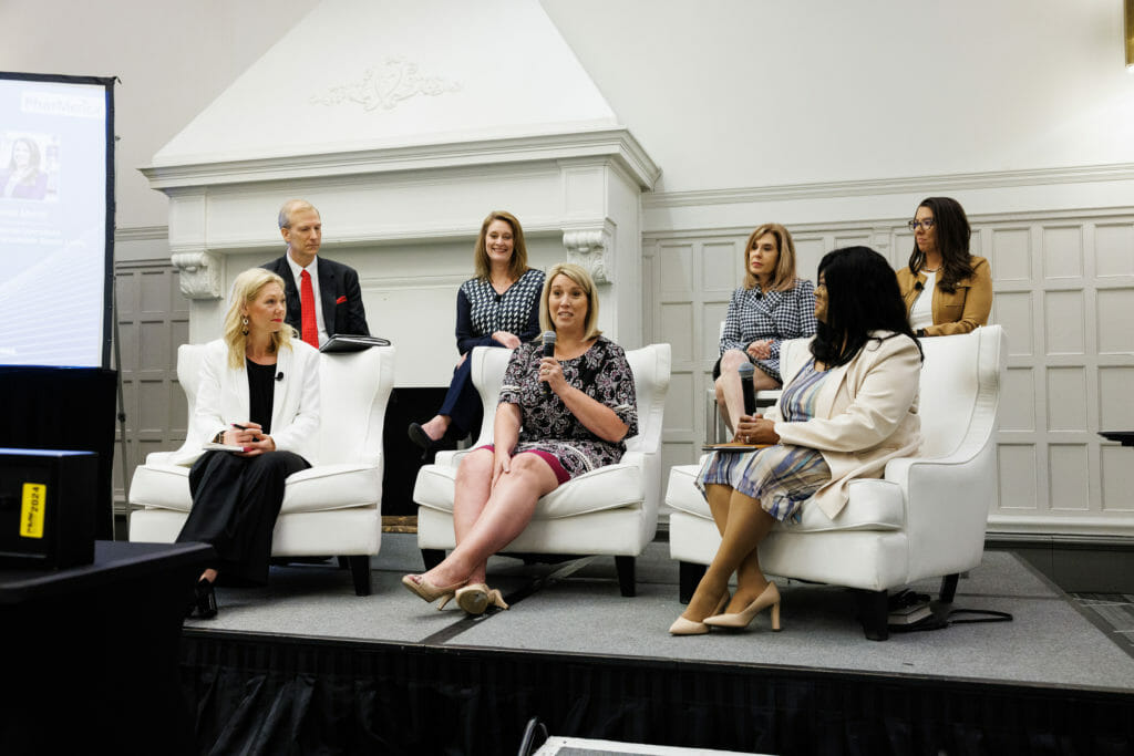 Panelists discuss the secrets of their success at a panel discussion of the Women of Distinction Forum.