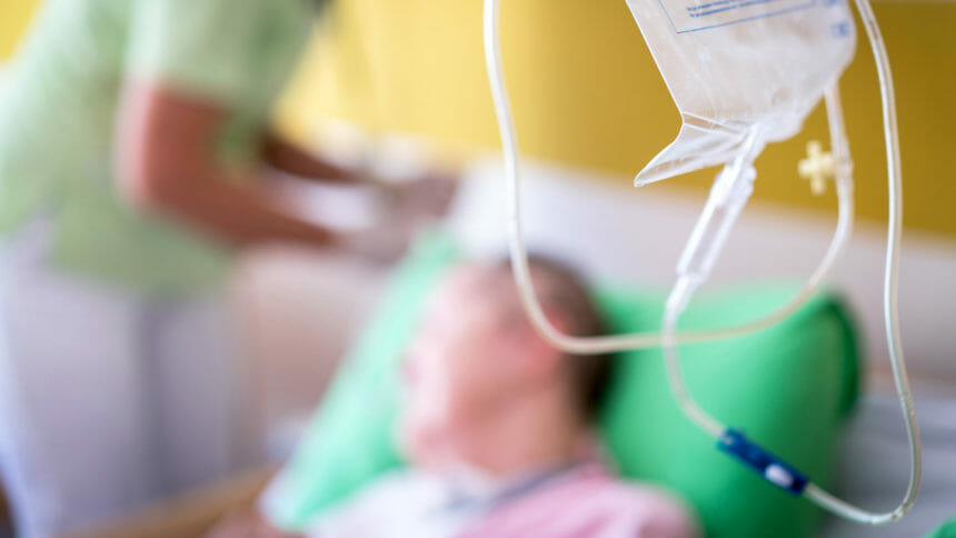 Nursing senior people in hospital bad - out of focus