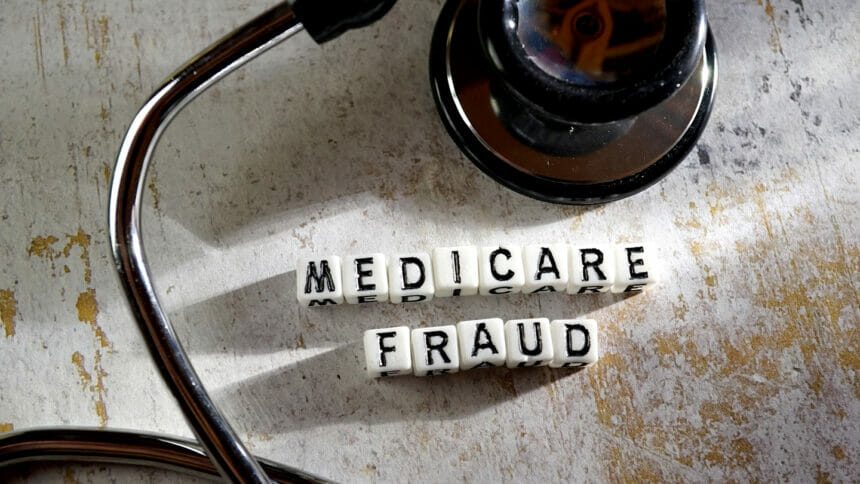 close up of word medicare fraud block letter