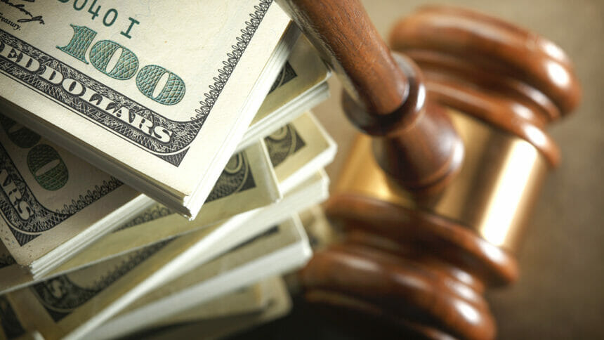 A conceptual look at money and the legal system. Shot with shallow depth of field.