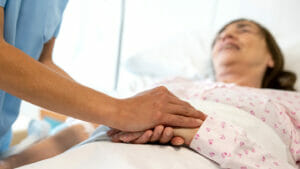 A palliative care patient receives care